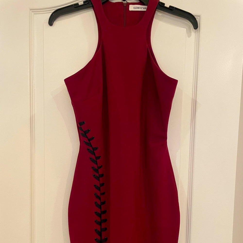 Elizabeth and James red wine color dress with black lace up accent and slit